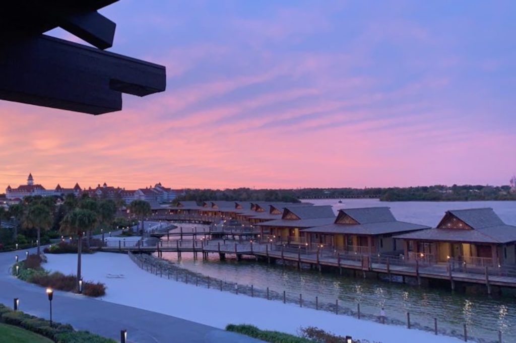 Disney DVC Polynesian view of water bungalows at sunset